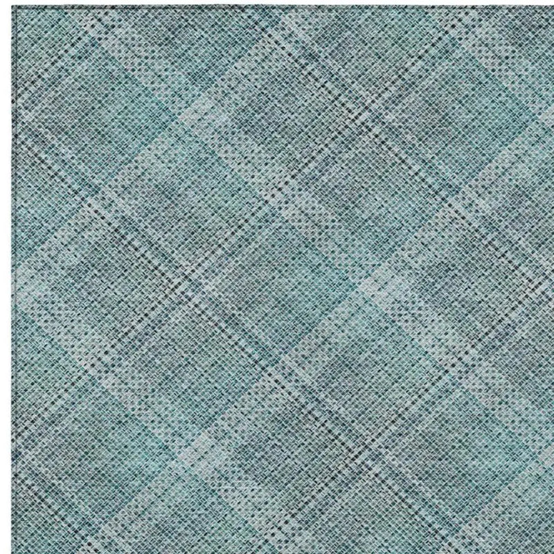 Turquoise and gray plaid patterned fabric, lightweight, ideal for crafting or upholstery projects.