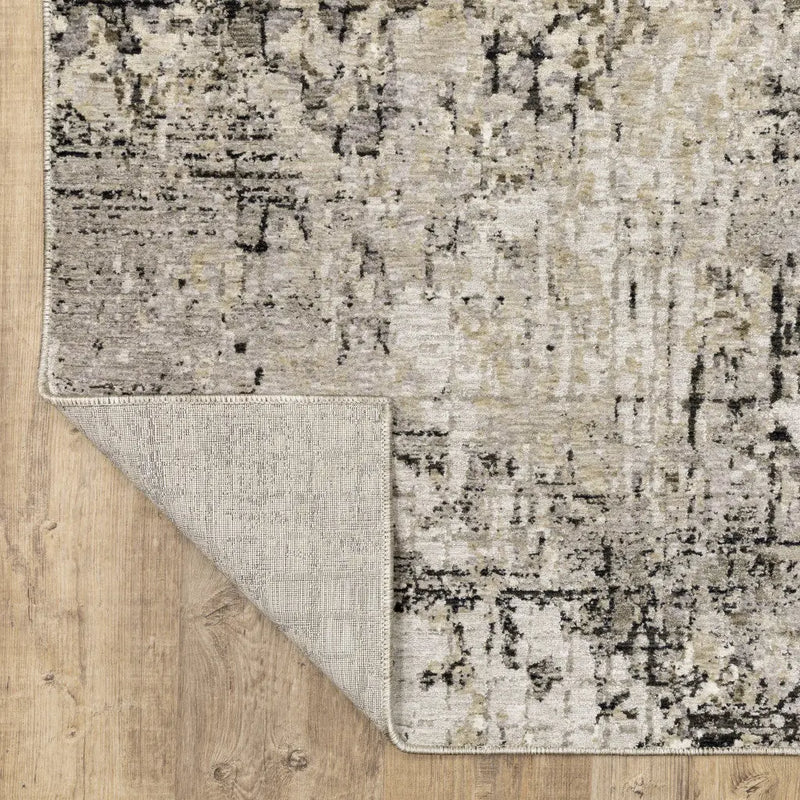 8' X 11' Grey Ivory Beige Charcoal Black Tan And Brown Abstract Power Loom Stain Resistant Area Rug Homeroots Home Decor