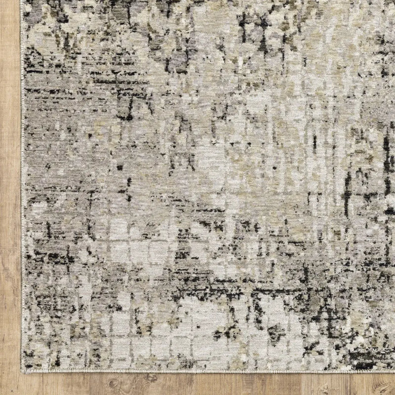 8' X 11' Grey Ivory Beige Charcoal Black Tan And Brown Abstract Power Loom Stain Resistant Area Rug Homeroots Home Decor