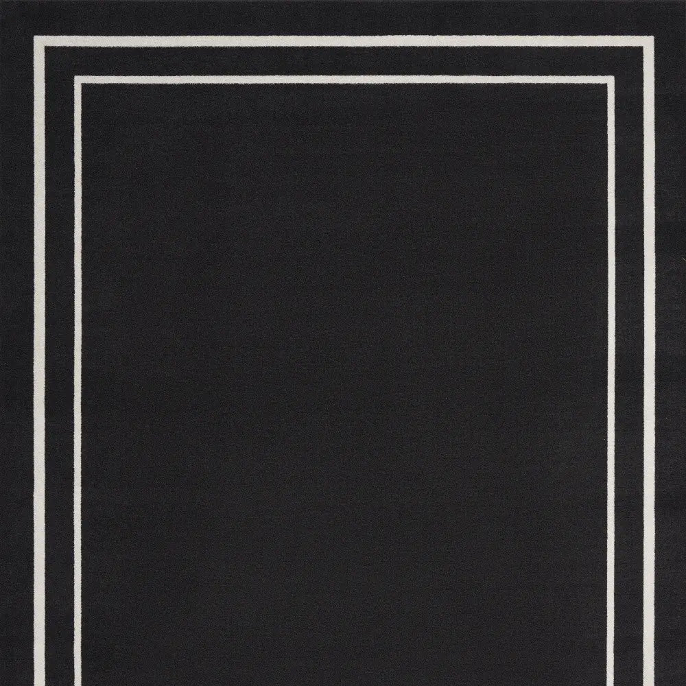9' X 12' Black And Ivory Indoor Outdoor Area Rug Homeroots Outdoor