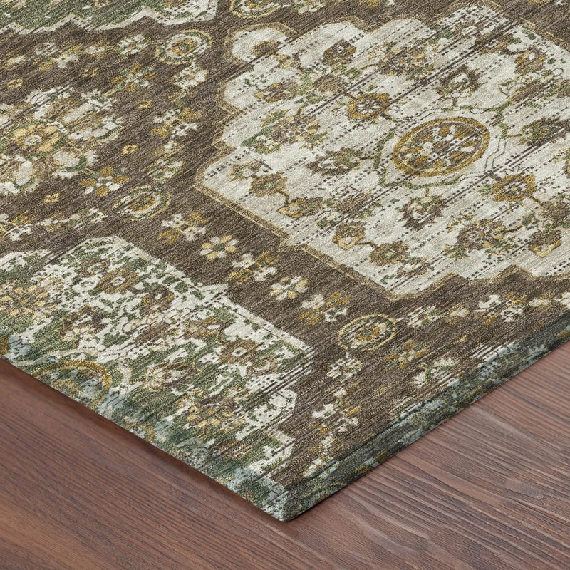 Vintage-inspired area rug in earthy browns, greens, and cream with intricate floral patterns, soft pile, and durable material.