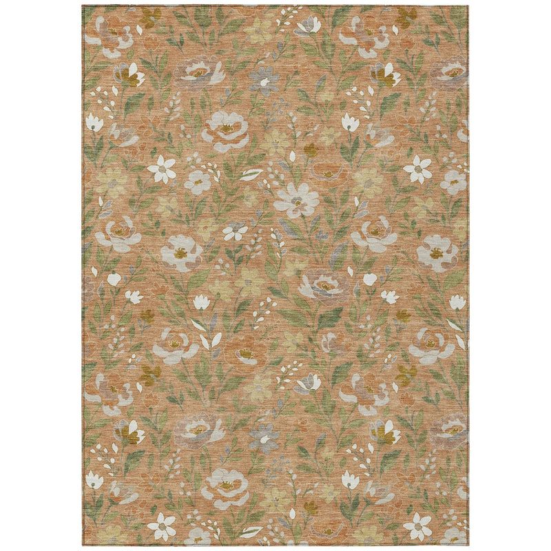 Floral area rug in orange and cream, featuring a botanical pattern on a woven texture for a cozy, stylish look.
