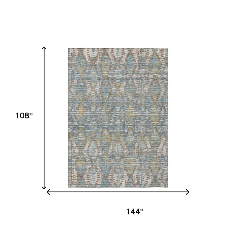 Multicolored area rug, 12' x 9', featuring a modern abstract pattern with blues, creams, and hints of yellow.
