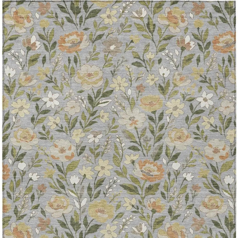Gray floral area rug with multicolored flowers in soft yellow, orange, and green tones, perfect for home decor.
