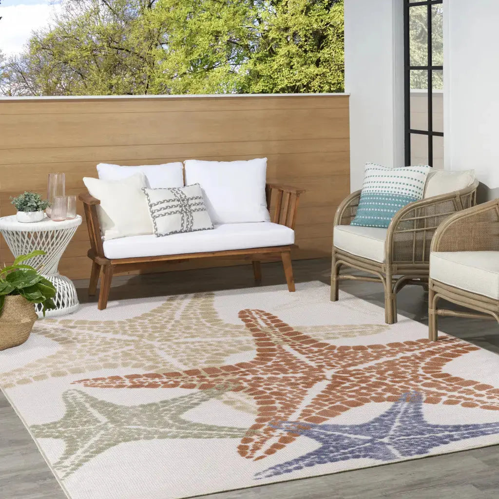 9' X 12' Ivory Blue Yellow Orange And Green Starfish Indoor Outdoor Area Rug Homeroots Outdoor