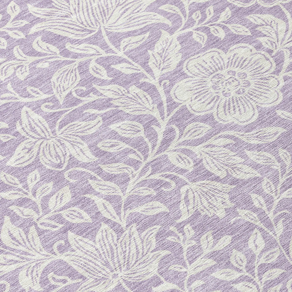 Lavender floral patterned textile with intricate white leaf and flower designs, perfect for home decor.