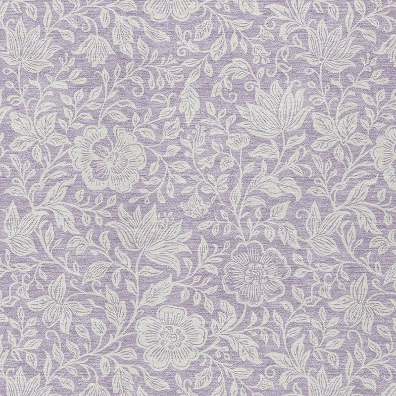 Light lavender floral fabric with intricate white embroidered patterns, perfect for upholstery or crafts.