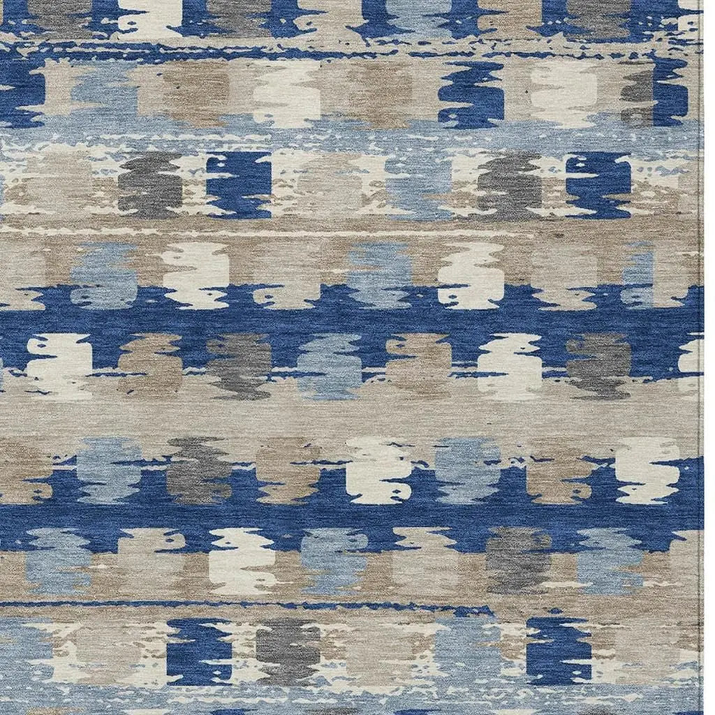 Blue and beige abstract patterned area rug in soft wool blend, perfect for contemporary home decor.