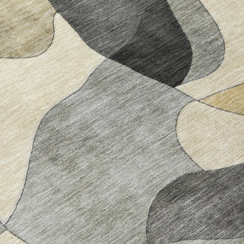 Abstract geometric area rug in gray, beige, and black; soft fabric, modern design, ideal for contemporary decor.