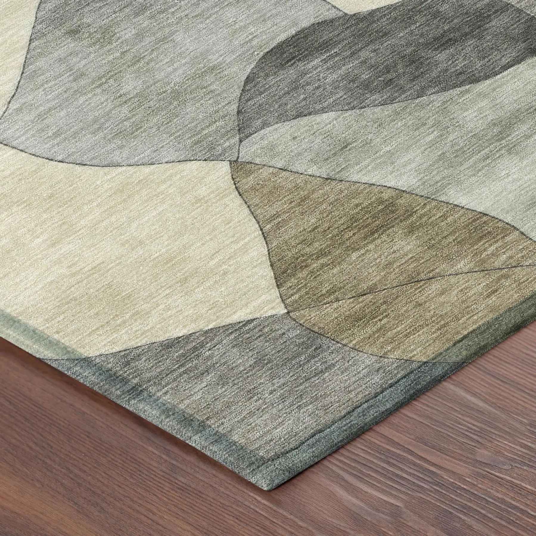 Textured abstract area rug in soft greens and neutrals, crafted from durable synthetic fibers for modern home decor.