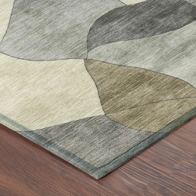 Textured abstract area rug in soft greens and neutrals, crafted from durable synthetic fibers for modern home decor.
