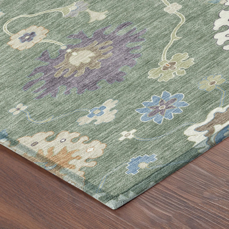 Green floral area rug with purple and cream accents, made of soft, durable fibers, perfect for a stylish home decor.