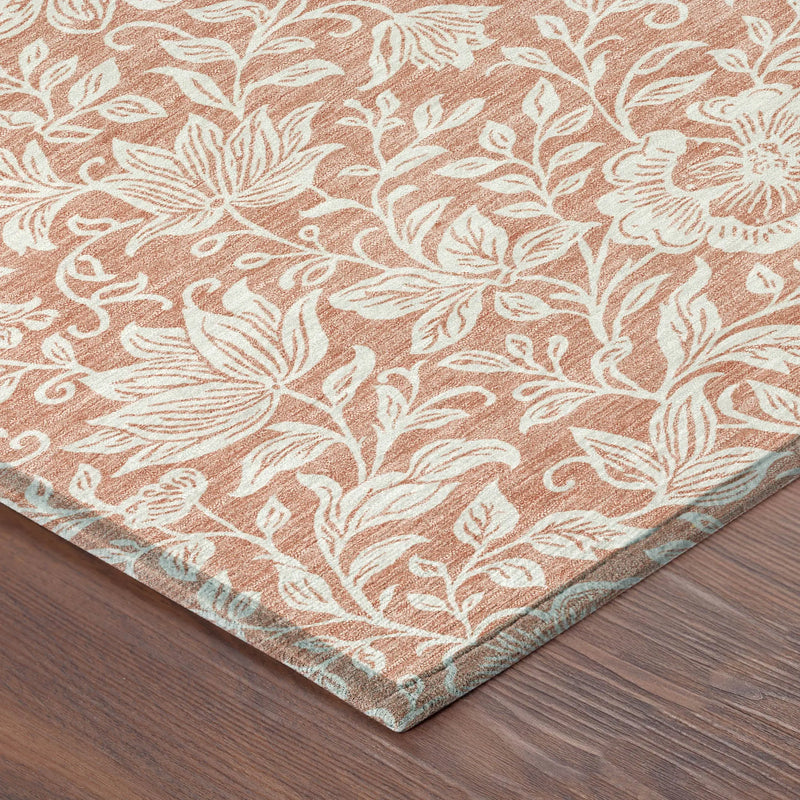 Rust floral pattern area rug in terracotta and cream, soft texture, perfect for enhancing home decor.