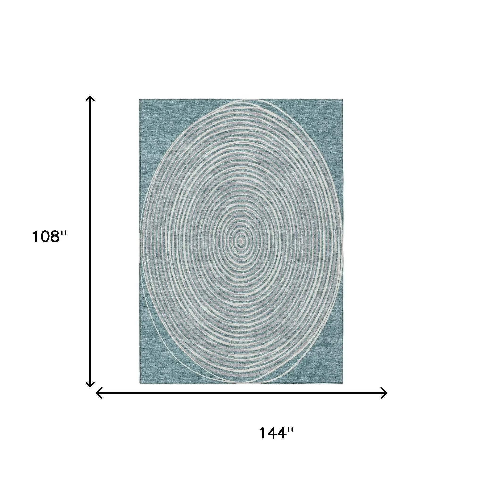 Oval geometric area rug in teal with ivory concentric circles, 108" x 144", modern interior decor accessory.
