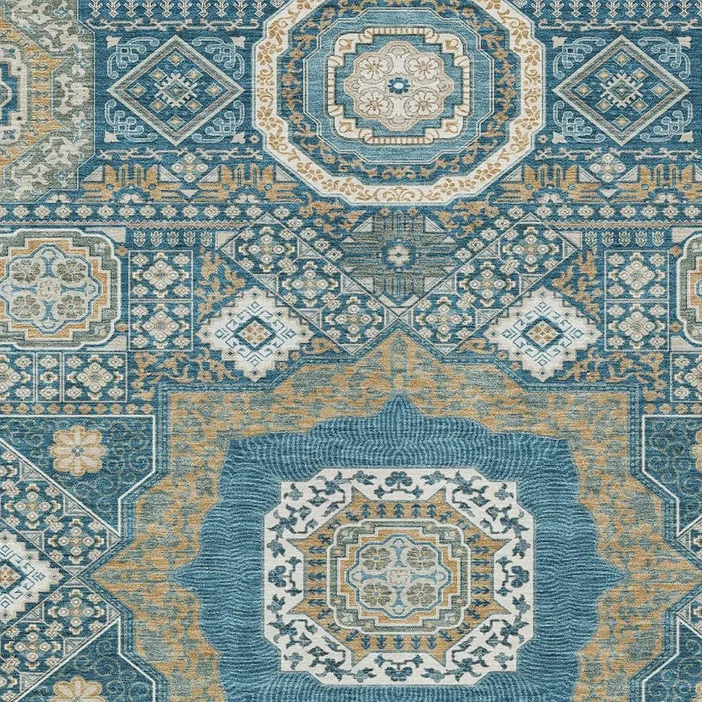 Blue and gold oriental patterned area rug, woven fabric, featuring intricate geometric designs and floral motifs.