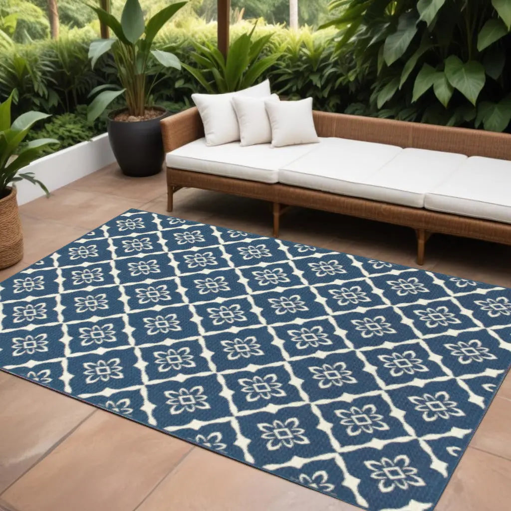 9' X 13' Blue and Ivory Floral Stain Resistant Indoor Outdoor Area Rug Homeroots Outdoor