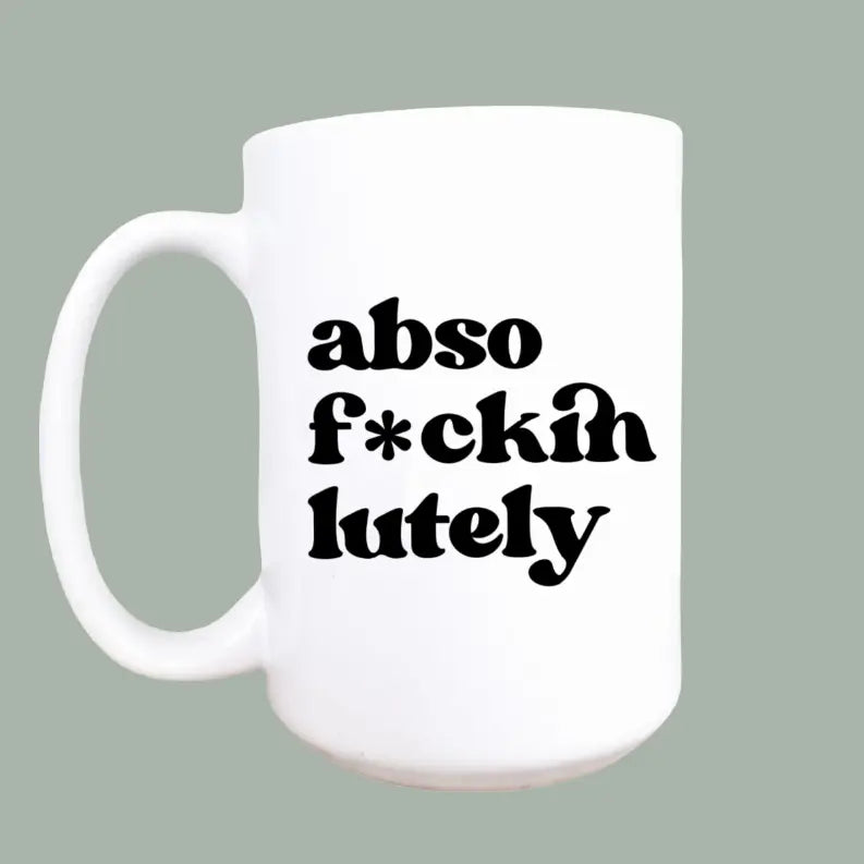 White ceramic mug featuring bold black text that reads "abso f*ckin lutely," perfect for gifting or personal use.