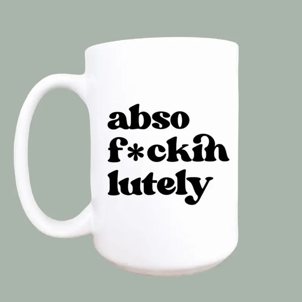 White ceramic mug featuring bold black text that reads "abso f*ckin lutely," perfect for gifting or personal use.