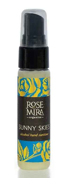 Rose Mira Sunny Skies alcohol hand sanitizer in a 2 oz spray bottle with floral design and bright yellow and blue colors.