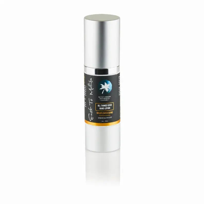 Silver airless pump bottle with black label, containing creamy all-purpose body moisturizer for dry skin.