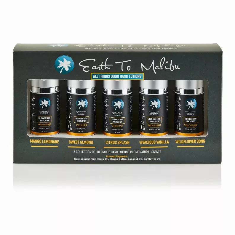 Set of five natural hand lotions in dark containers, featuring Mango Lemonade, Sweet Almond, Citrus Splash, Vivacious Vanilla, Wildflower Song scents.
