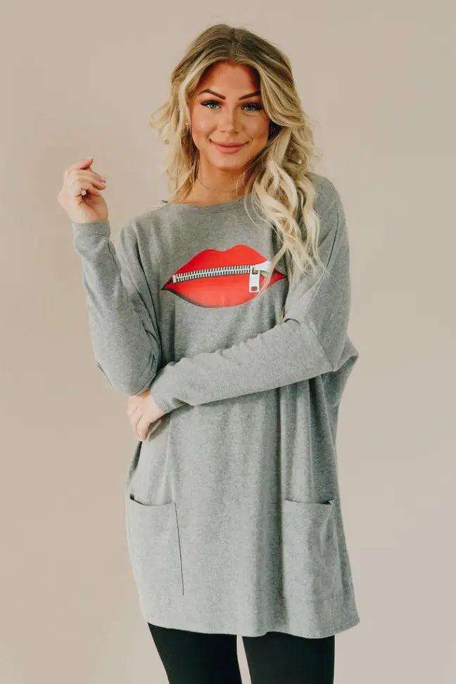All Zipped Up Lips Pocket Tunic Stay Warm in Style