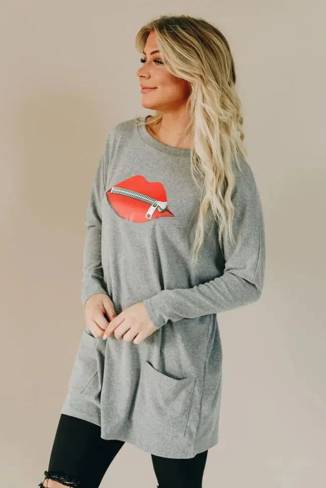 All Zipped Up Lips Pocket Tunic Stay Warm in Style