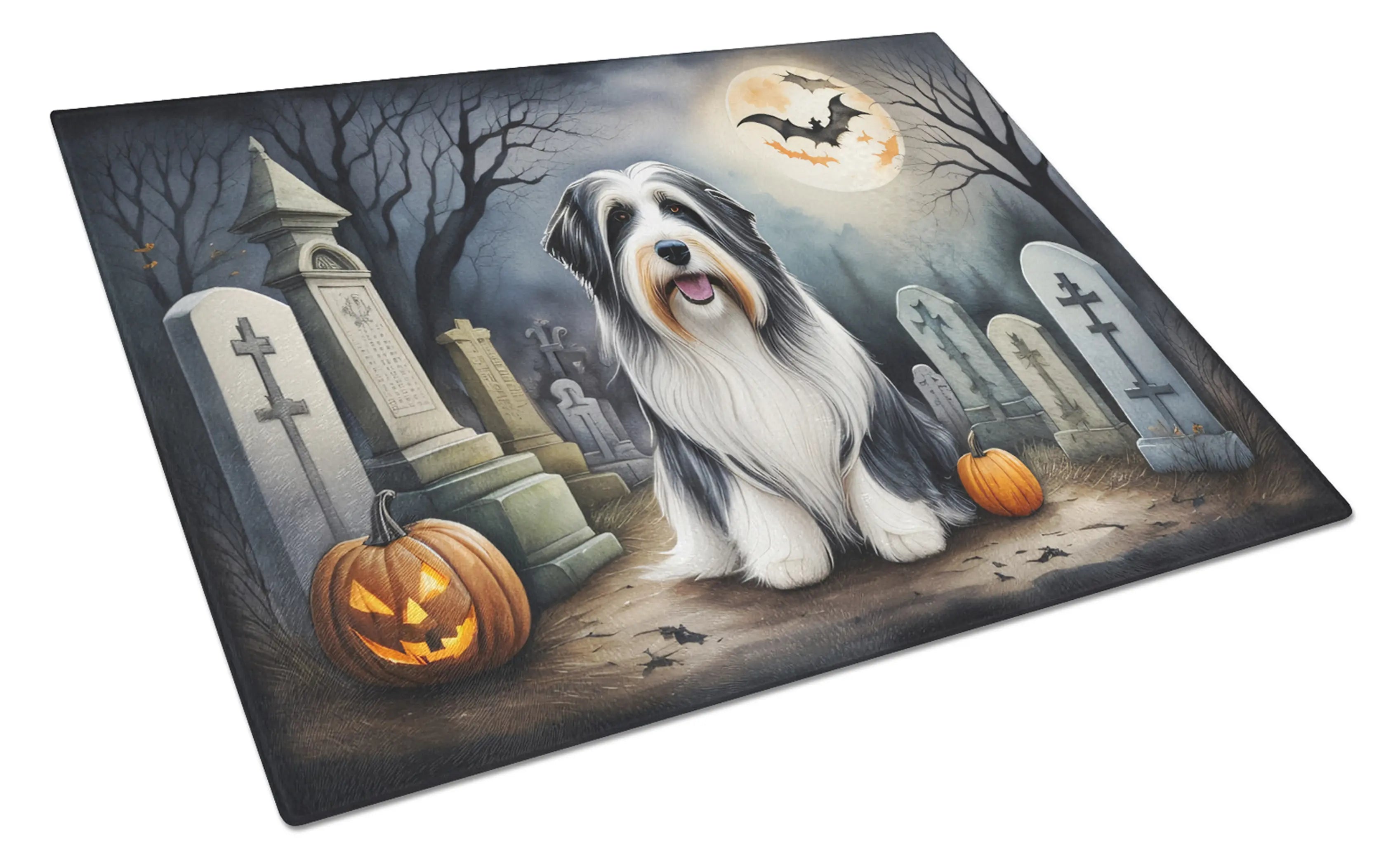 Halloween-themed dog mat featuring a black and white dog, tombstones, and pumpkins in spooky colors.