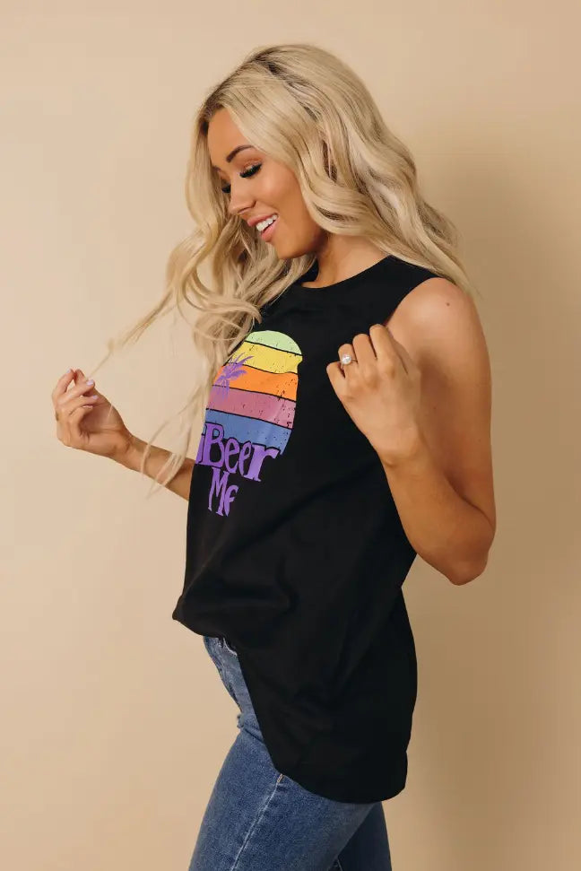 Black sleeveless tee with rainbow "Beer Me" graphic, casual style, perfect for summer outings.