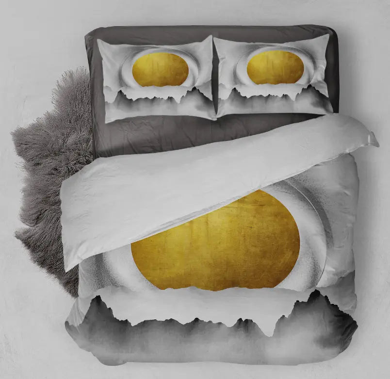 Modern bedding set featuring a distressed yellow sun design on gray fabric, complete with matching pillow shams.