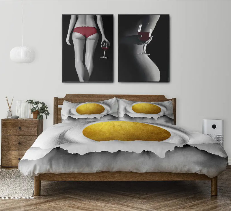 Egg yolk print duvet cover set in grey and white, featuring vibrant yellow accents, styled in modern bedroom decor.