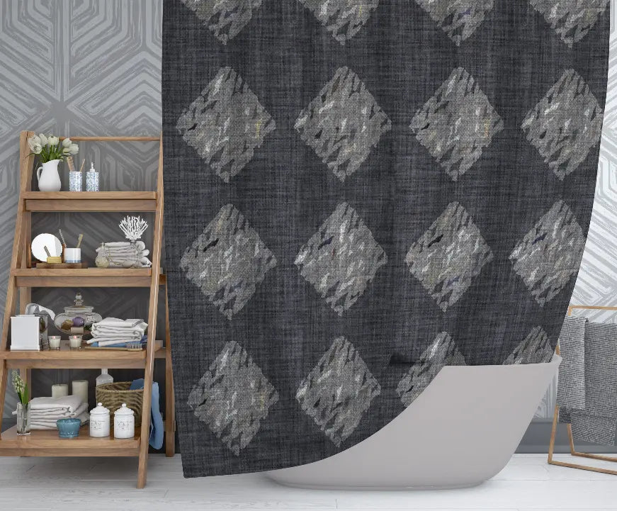 Gray geometric patterned shower curtain in textured fabric, adding modern style to bathroom decor.