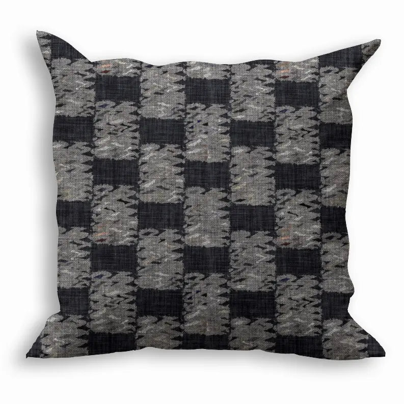 Navy and gray woven decorative pillow with a modern geometric pattern, perfect for stylish home decor.