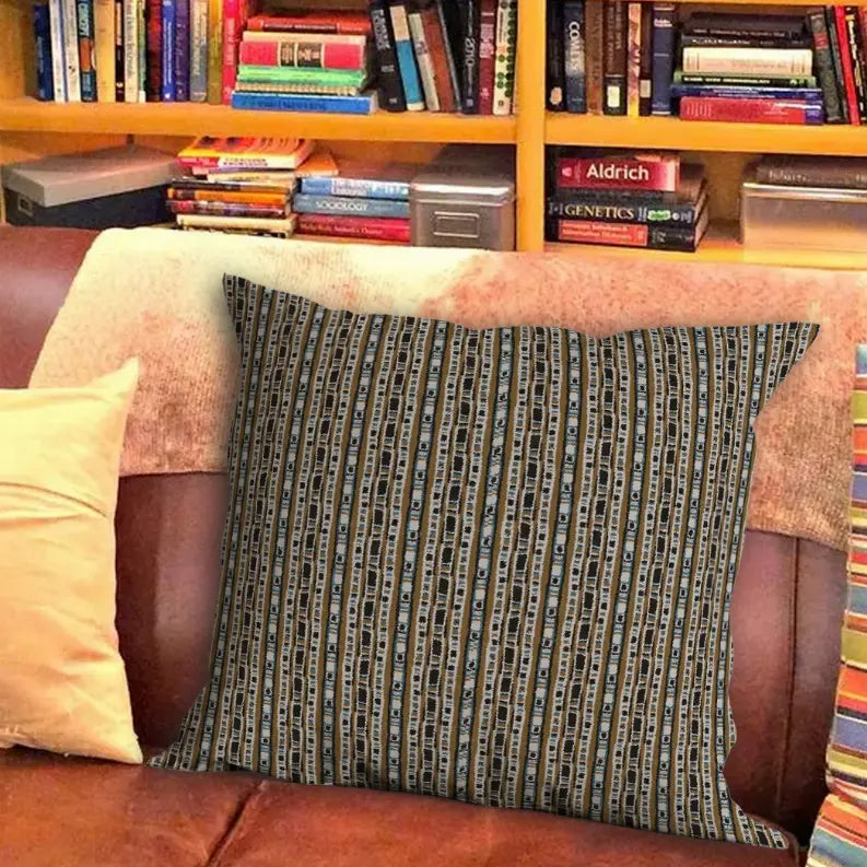 Black and blue patterned throw pillow, made of soft fabric, perfect for modern home decor.