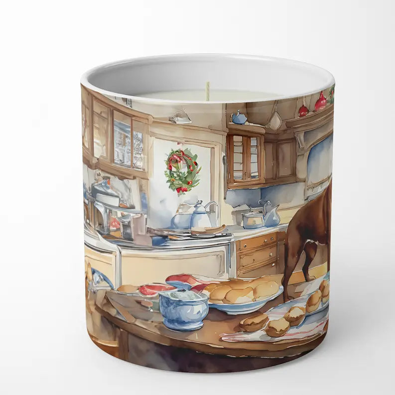 "Charming kitchen scene candle with holiday wreath and baked goods design, featuring warm colors and artistic details."
