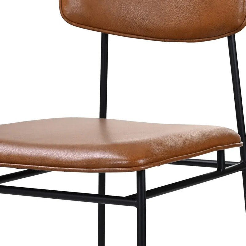 Brown faux leather dining chair with black metal frame, modern style, and minimalist design.