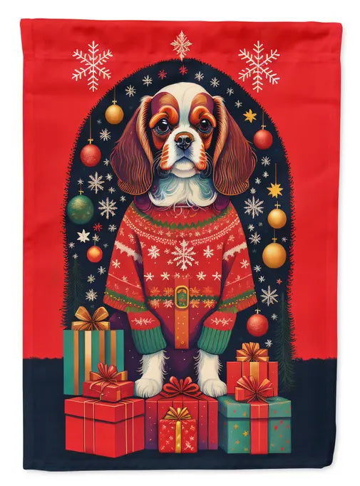 Red Christmas dog flag featuring a Cavalier King Charles Spaniel in a sweater, surrounded by colorful presents and snowflakes.