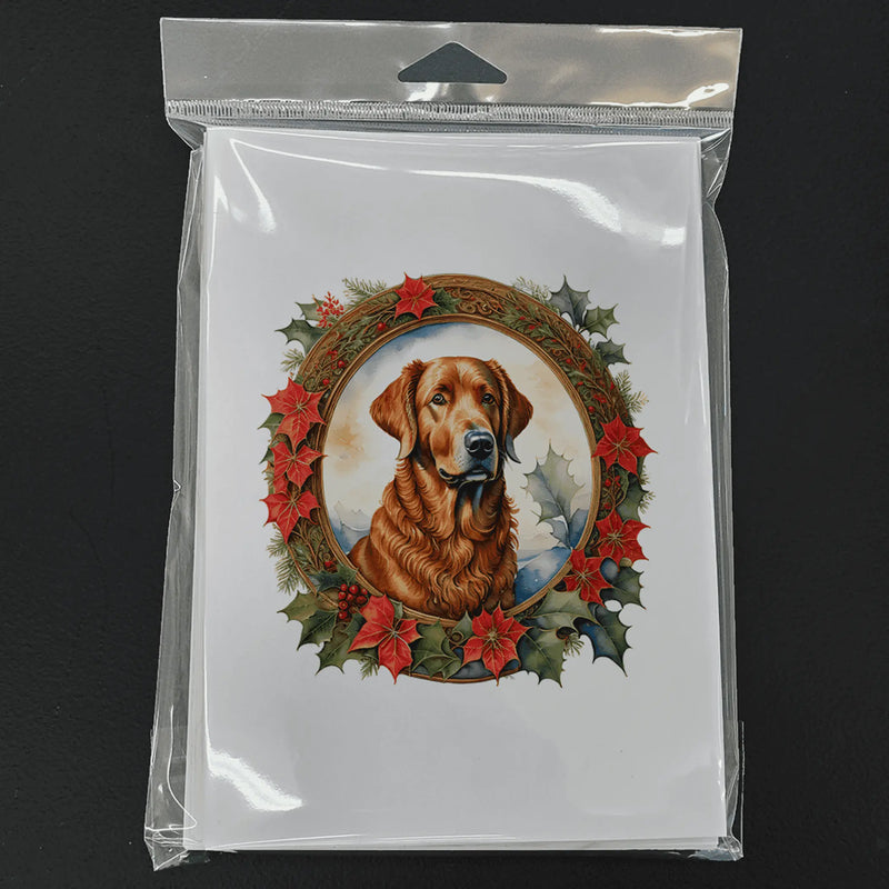 Golden retriever greeting card with festive holly and poinsettia design, packaged in a clear plastic sleeve.