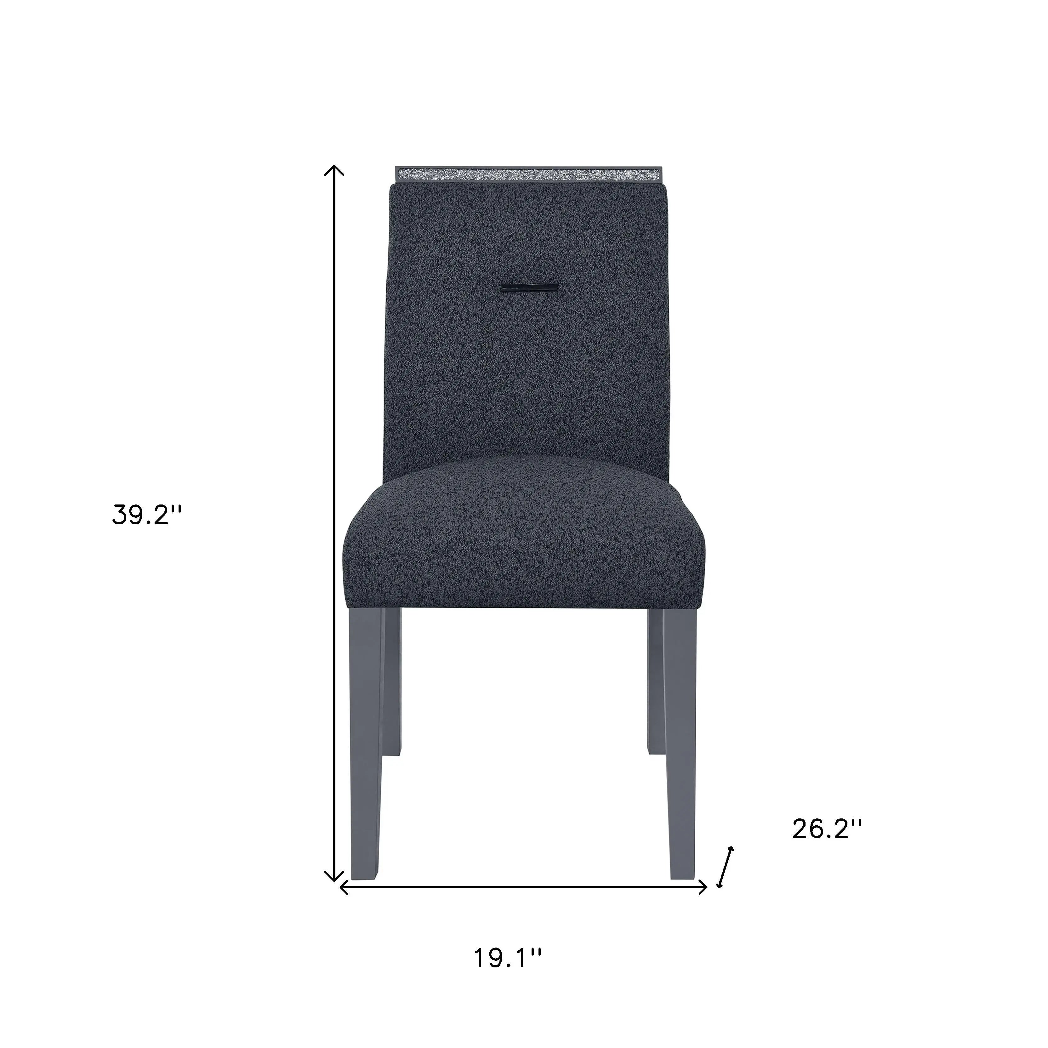 Modern gray upholstered dining chair with a sleek design and sturdy wooden legs, measuring 39.2" H x 19.1" W x 26.2" D.