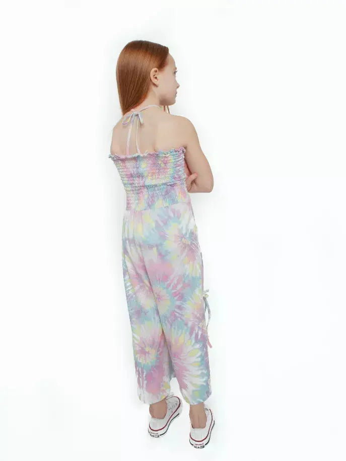 Pastel tie-dye girls' jumpsuit, smocked bodice, lightweight fabric, perfect for summer outings.
