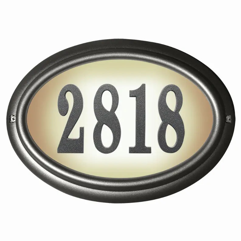 Elegant oval house number plaque in brushed bronze, featuring bold black numbers "2818" on a stainless steel background.