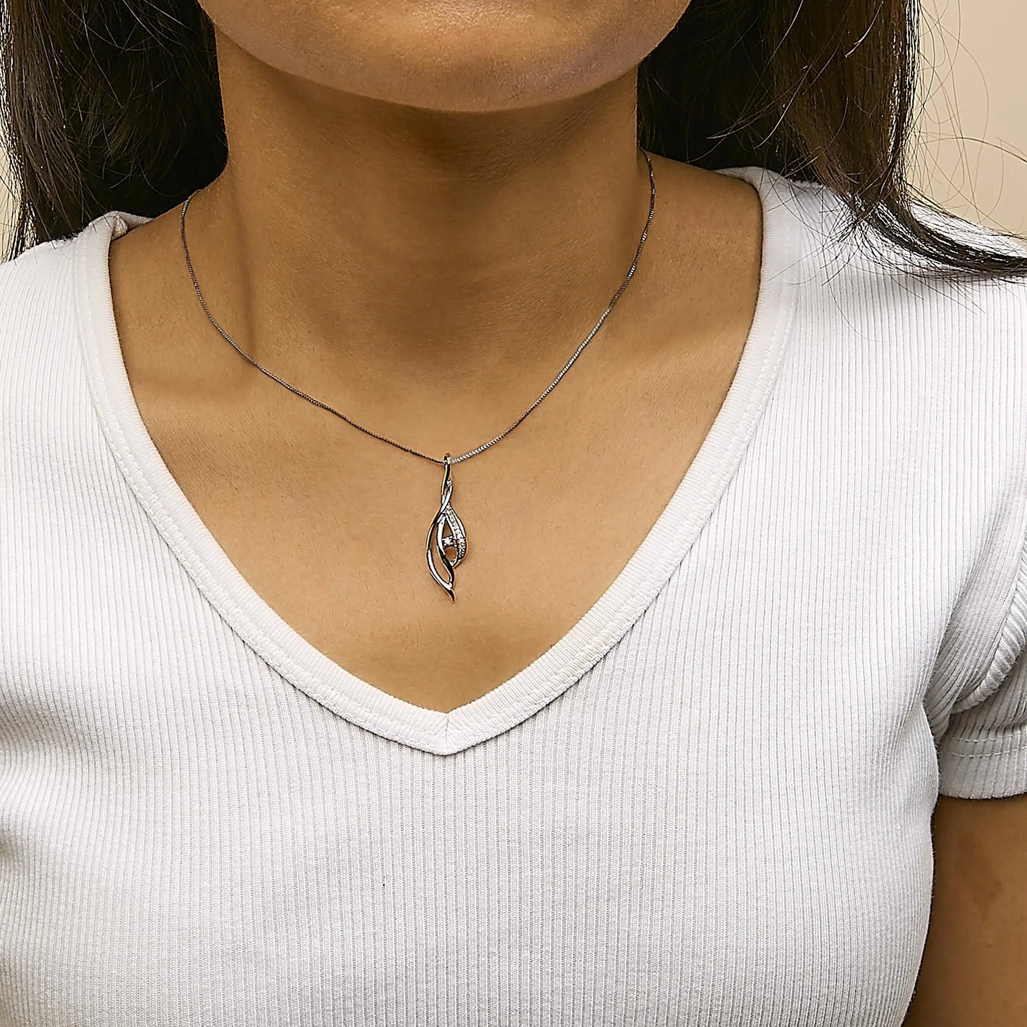 Espira 10K White Gold Round Diamond Accented Open Cascade Twist 18" Pendant Necklace (1/10 Cttw, J-K Color, I1-I2 Clarity) Infinite Jewels