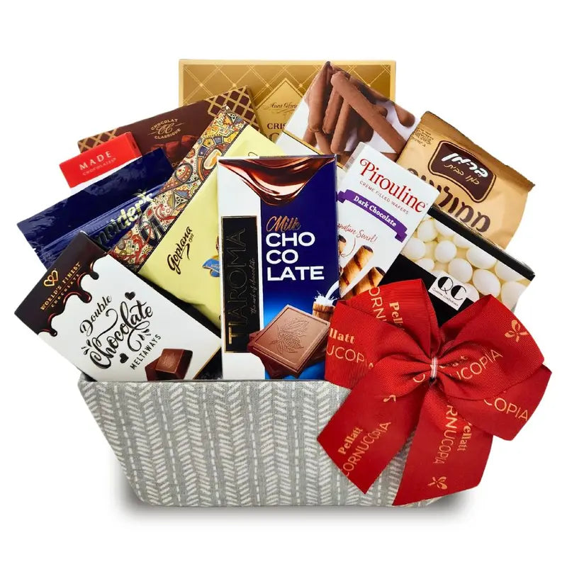 Elegant gift basket filled with assorted chocolates, cookies, and sweets, featuring a stylish gray and white pattern.
