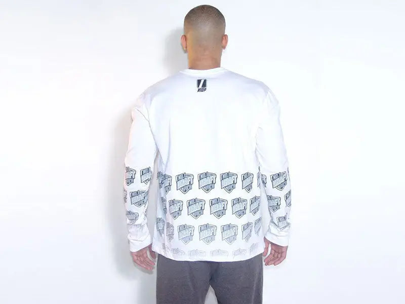 White long sleeve t-shirt with gray graphic print on sleeves, perfect for casual streetwear style.
