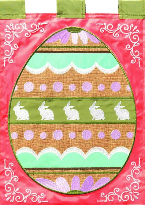 Colorful Easter egg banner with pink, green, and brown hues, featuring white bunnies and decorative patterns.