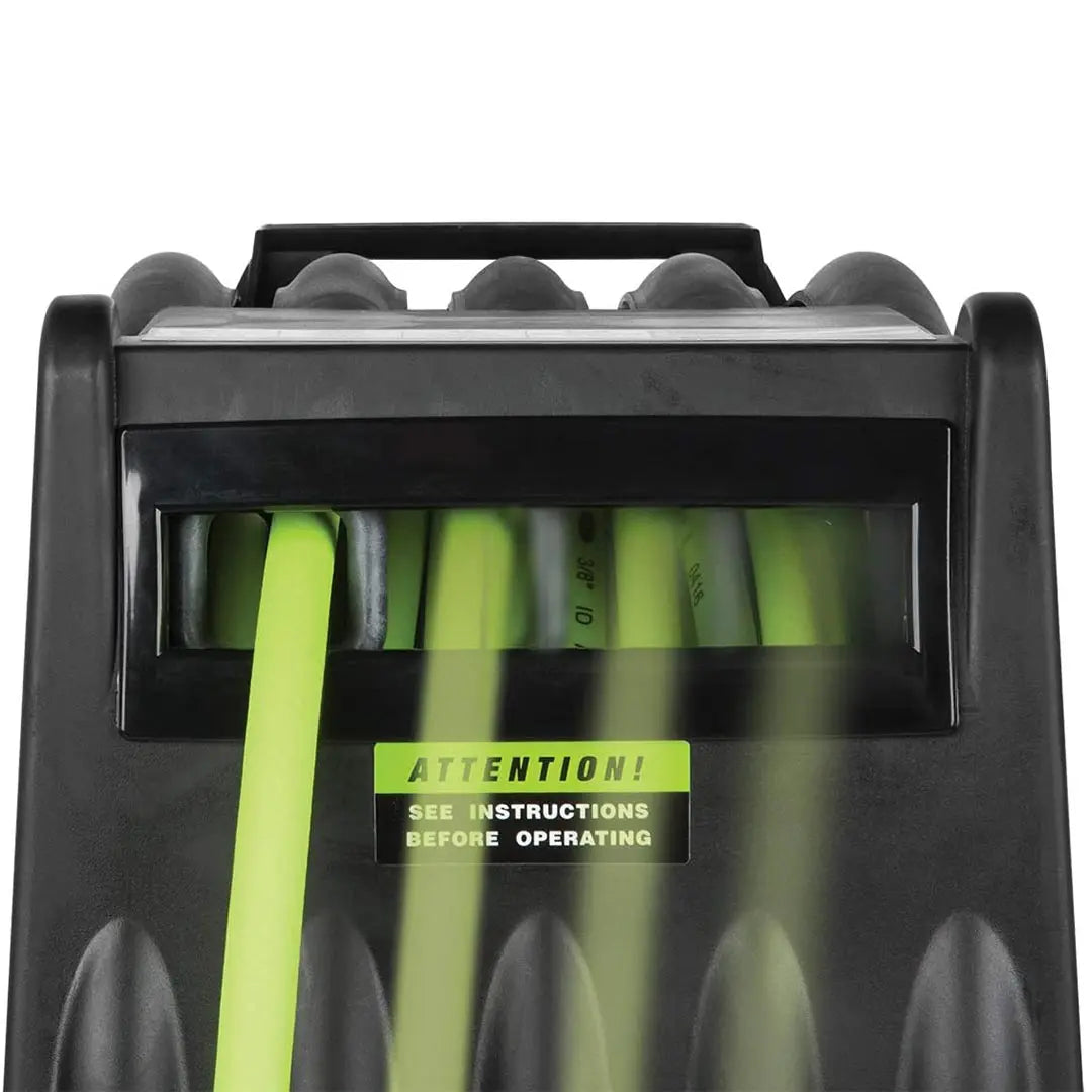 Green hose stored in a black durable reel, designed for easy access and organization in outdoor settings.