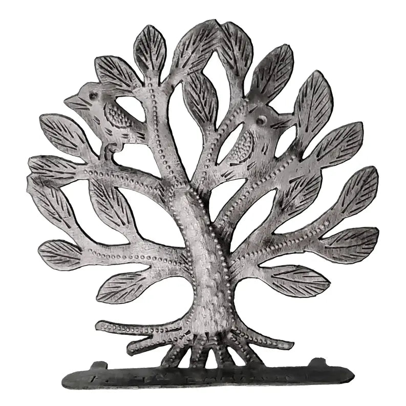 Handcrafted metal tree sculpture in silver finish with intricate leaves and bird details, perfect for rustic decor.