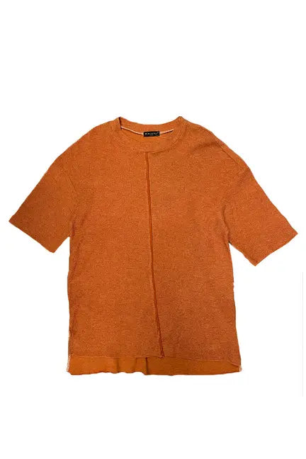 Rust orange short-sleeve knit top with a unique seam detail and relaxed fit, perfect for casual outings.