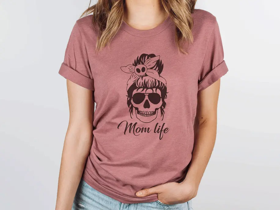 Heather mauve graphic tee featuring a skull with sunglasses and a bandana, styled for "Mom life" enthusiasts.