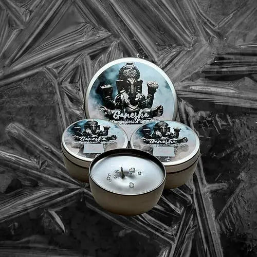 Set of three Ganesha-themed soy wax candles, featuring silver tins and decorative lids with intricate designs.